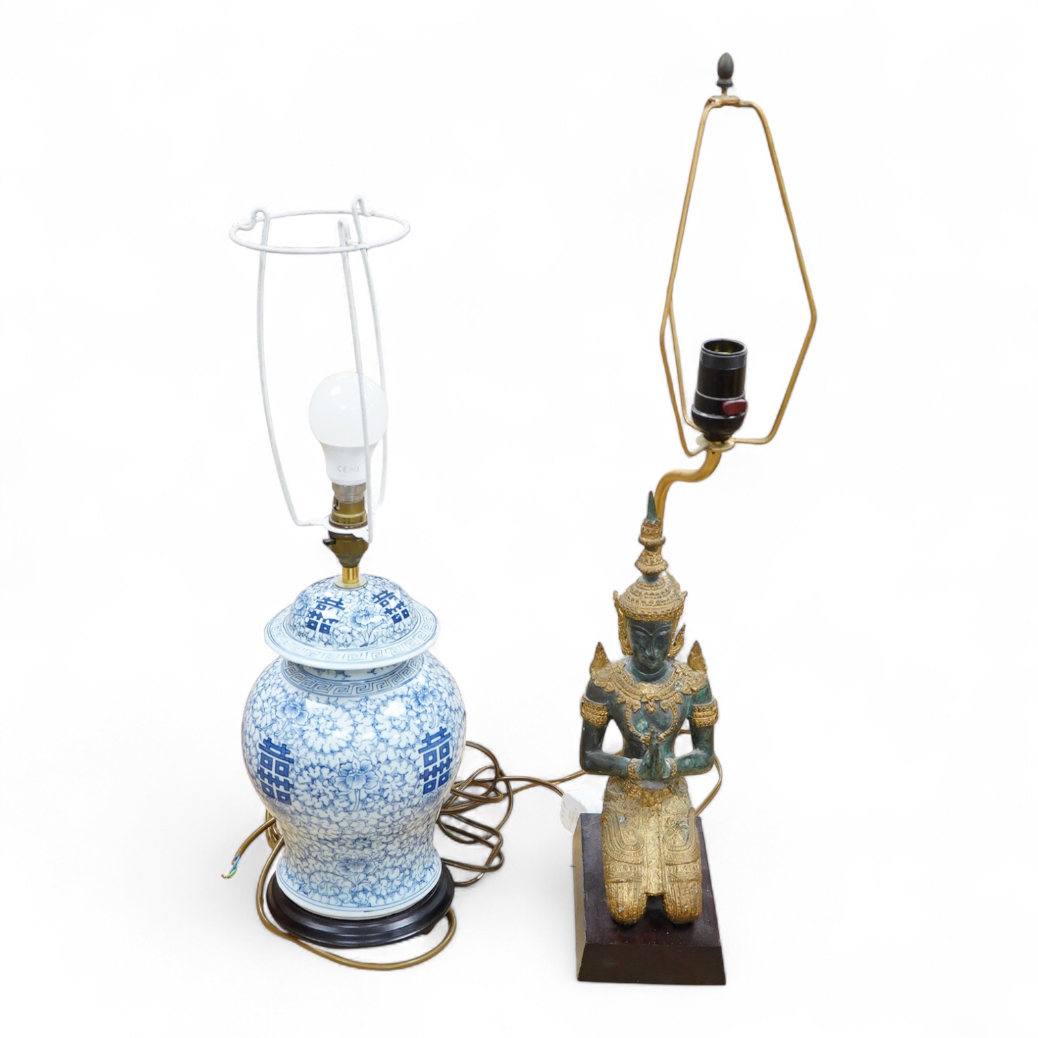 A Chinese blue and white ‘shuangxi’ vase and cover, mounted as a lamp, together with a lamp mounted with a bronze Thai figure, largest 50cm high including light fitting